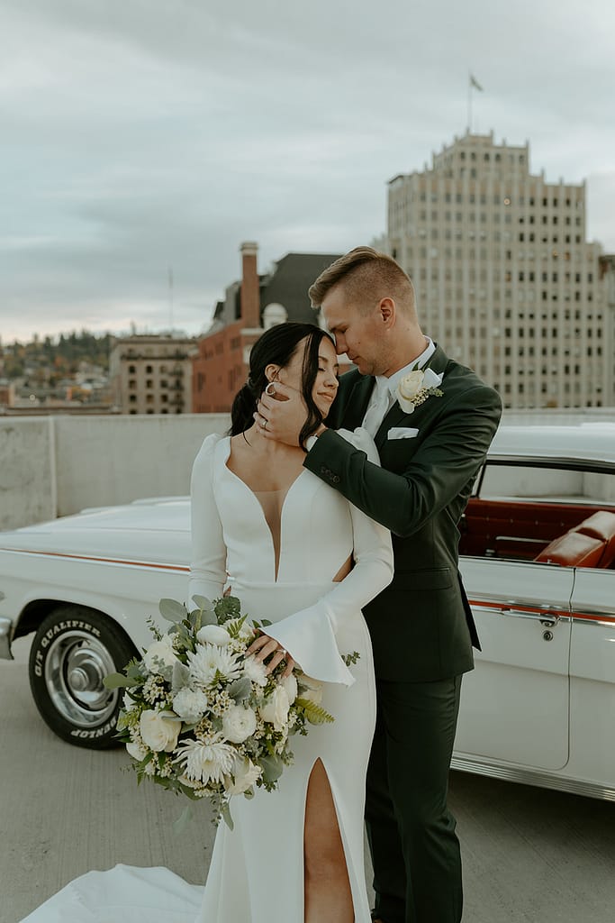 bride and groom on hotel rooftop in Spokane, WA