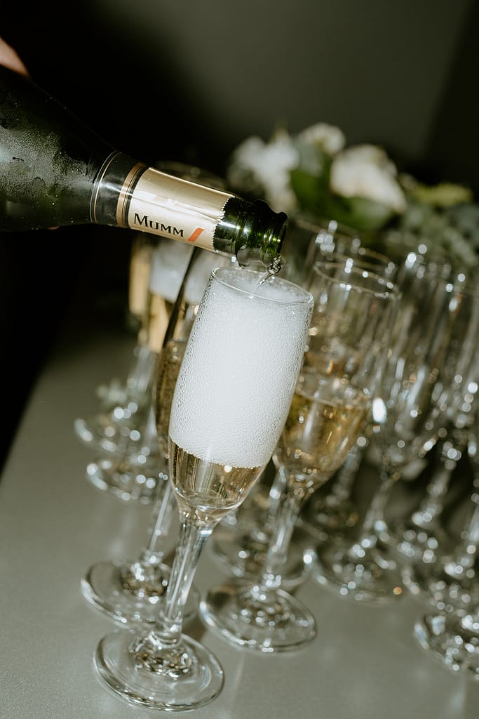 champagne pouring into glasses
