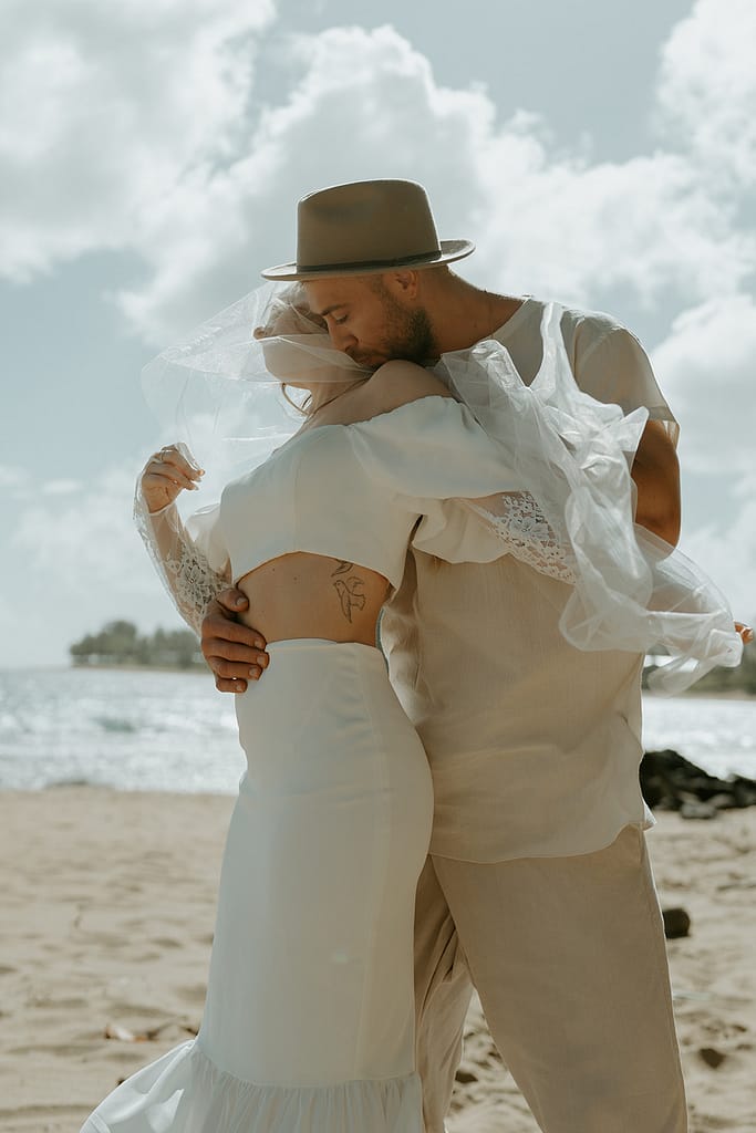 Newlyweds enjoying the serene atmosphere of their elopement in Kauai.